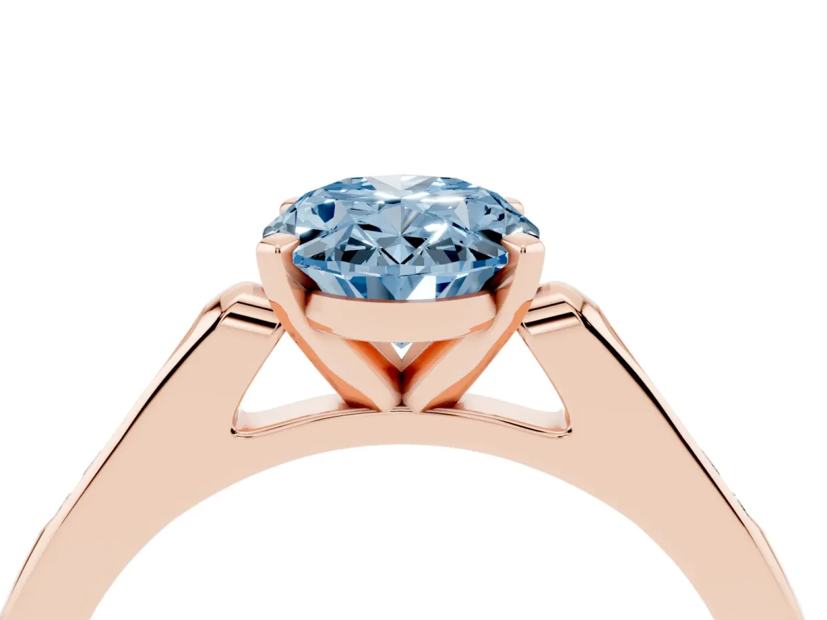 Fancy Blue Oval Cut Diamond Solitaire Ring with Channel Set Round Band and Prong Setting Rose gold