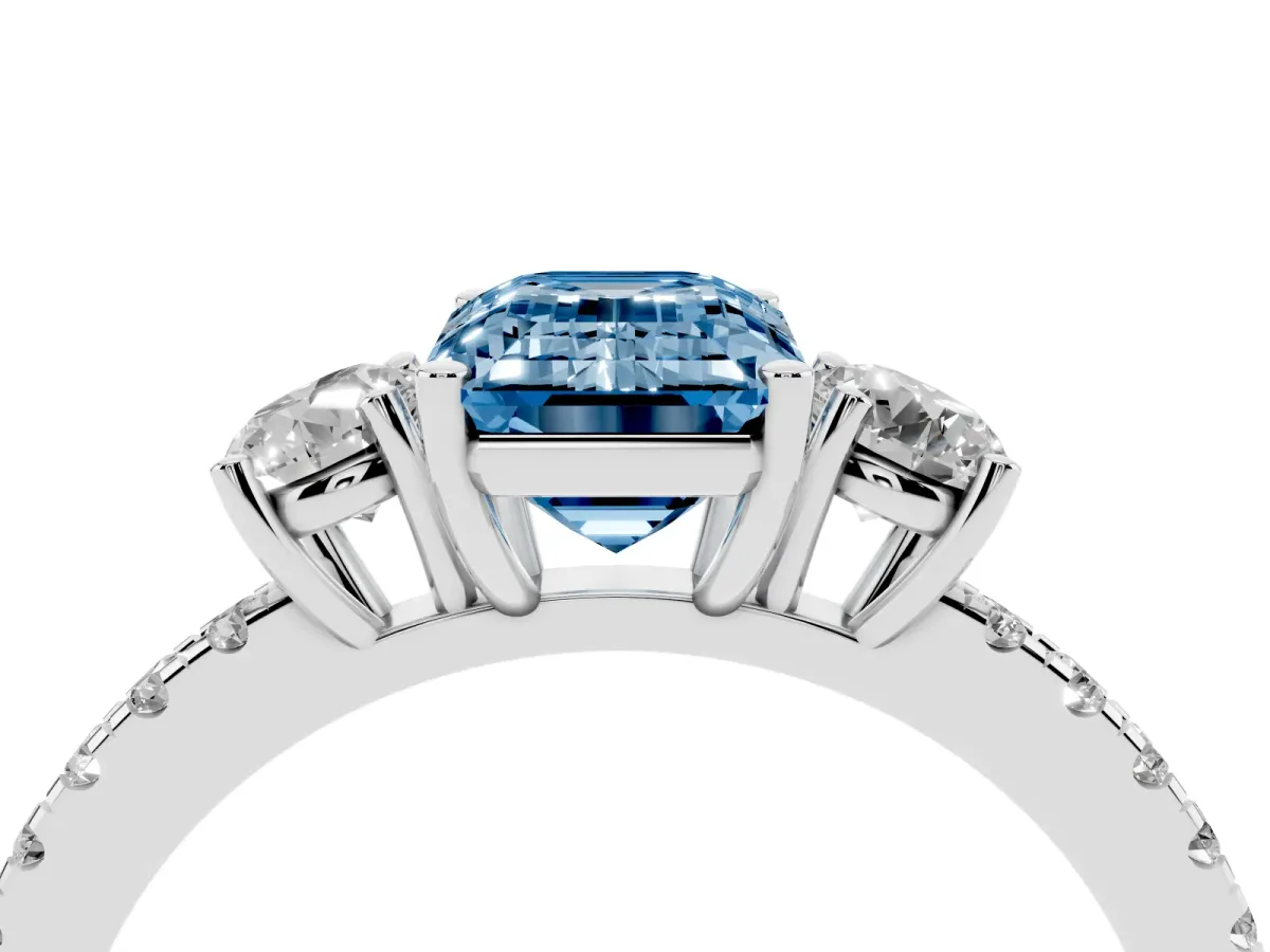 Fancy Blue Three-Stone Emerald Cut Cut Diamond Pavé Band with Prong Setting Platinum
