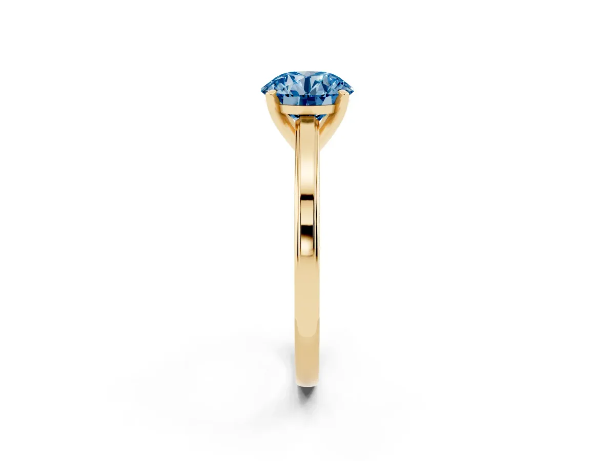Fancy Blue Round Cut Solitaire Diamond Ring with Four-Prong Setting and Classic Band Yellow gold