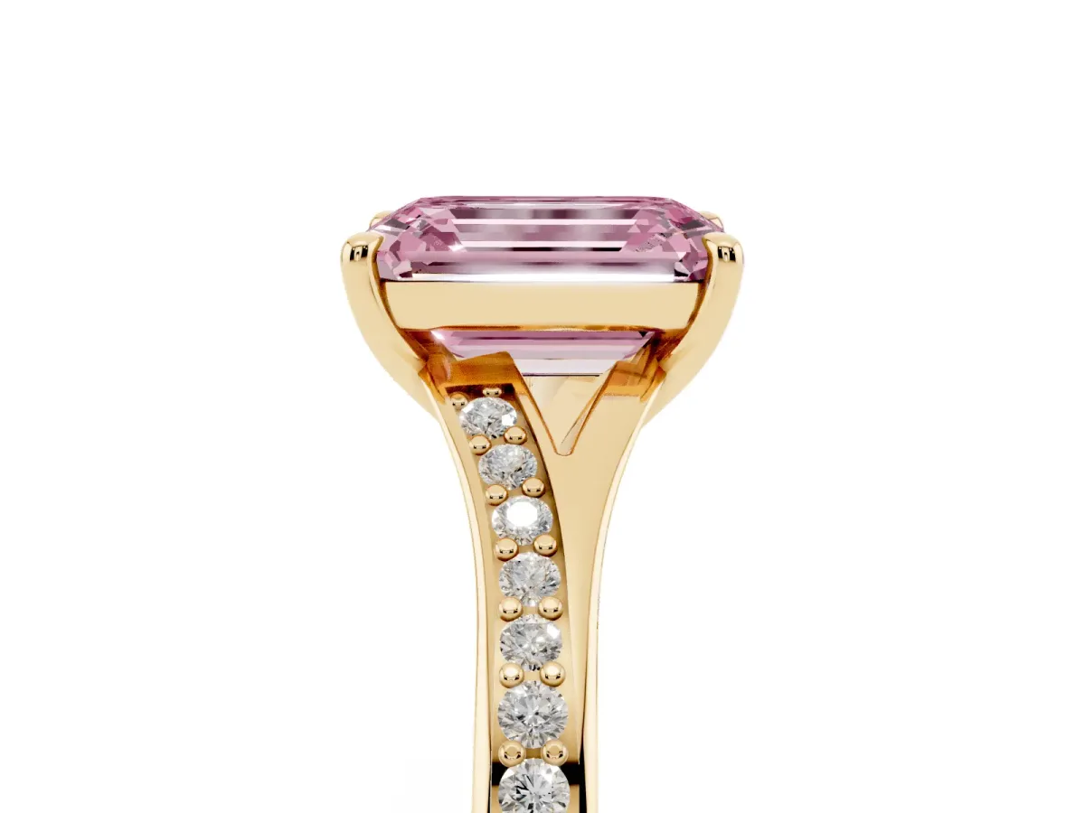 Fancy Pink Emerald Cut Diamond Solitaire Ring with Pavé Band and Prong Setting Yellow gold
