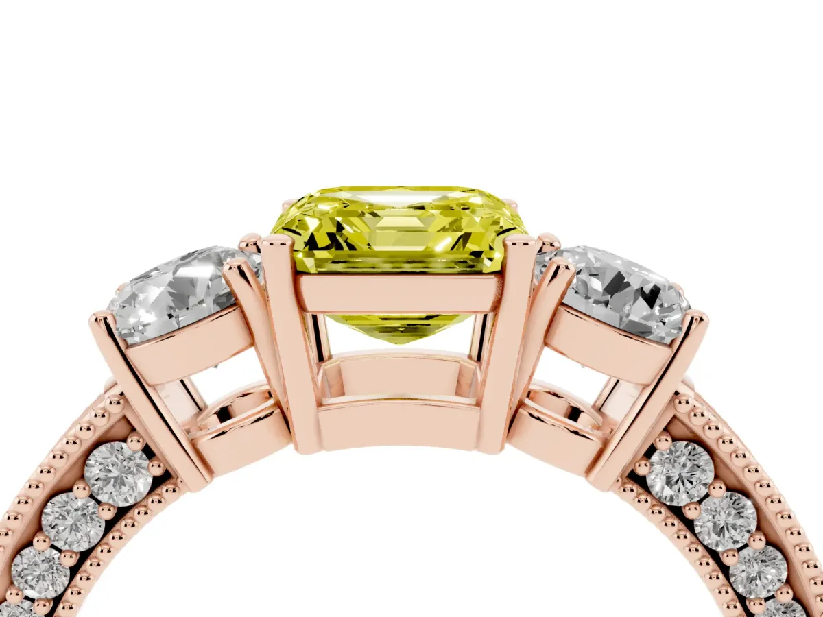 Fancy Yellow Asscher Cut Three-Stone Diamond Ring with Pavé Band and Four-Prong Setting Rose gold