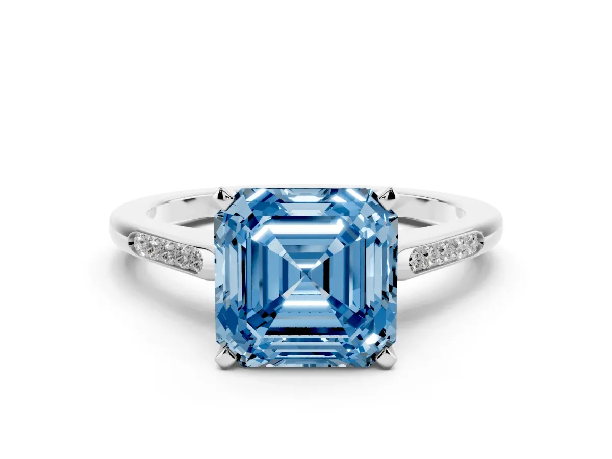 Fancy Blue Asscher Cut Diamond Solitaire Ring with Channel Set Round Band and Prong Setting Silver