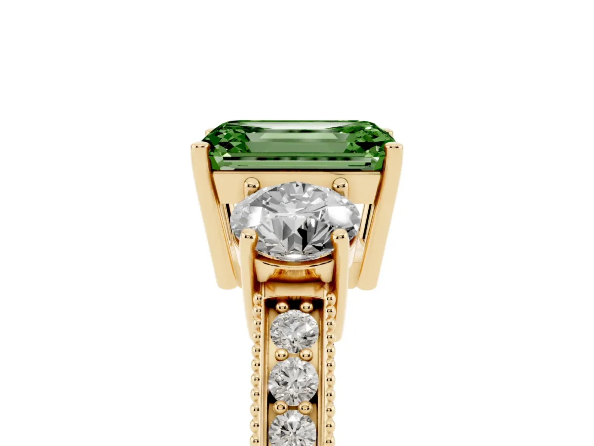 Fancy Green Emerald Cut Three-Stone Diamond Ring with Pavé Band and Four-Prong Setting Yellow gold