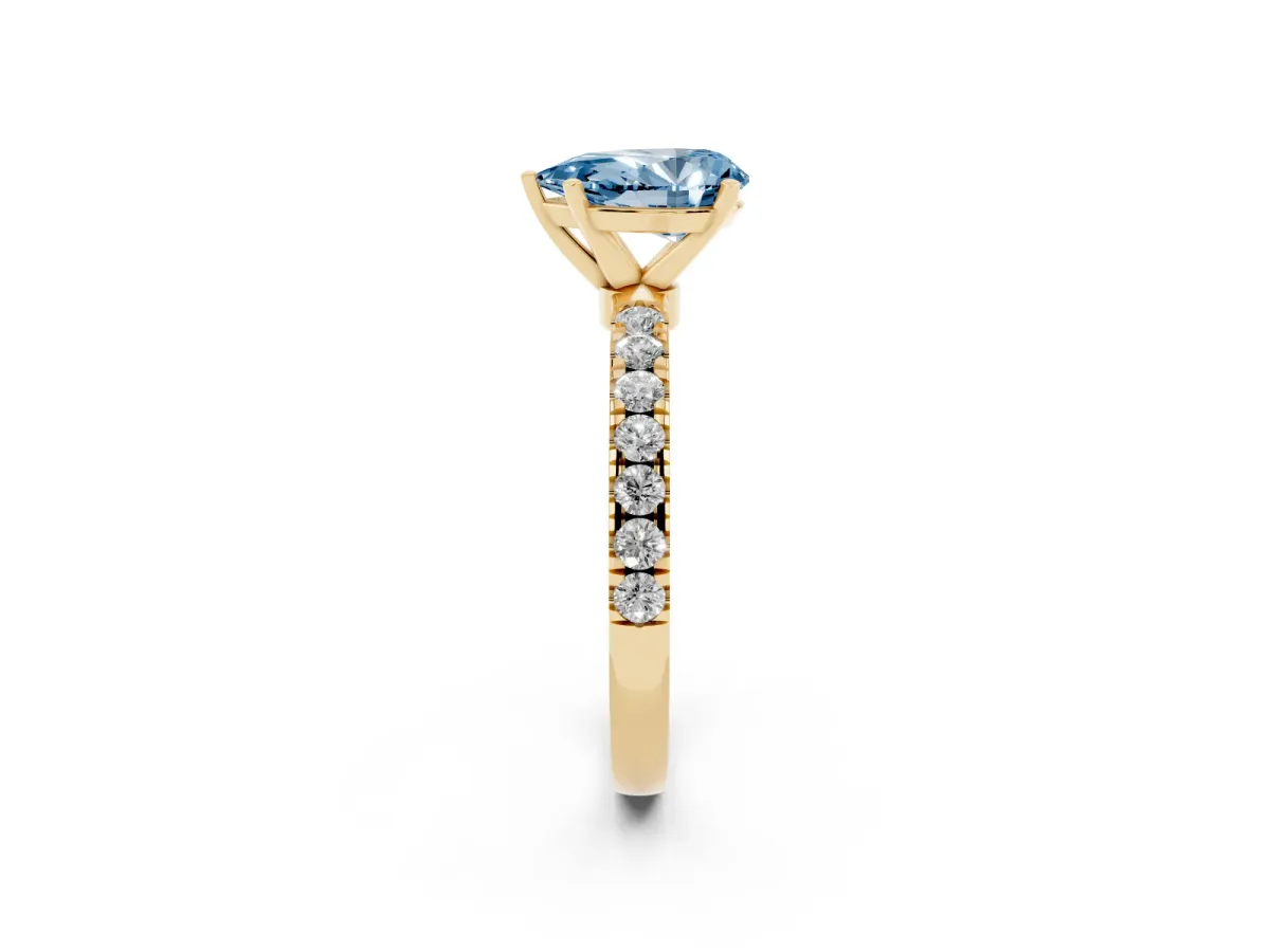 Fancy Blue Pear Cut Diamond Solitaire Ring with Pavé Accents and Four-Prong Setting Yellow gold