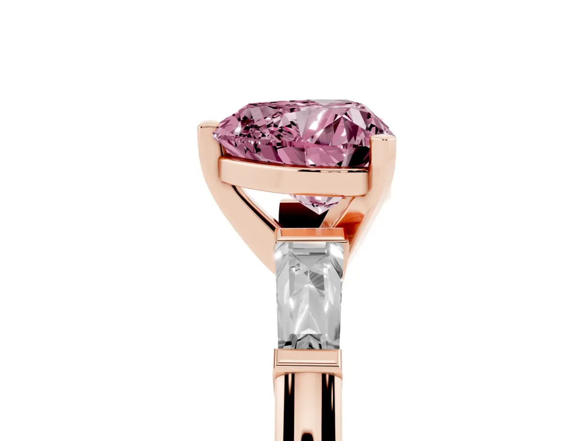 Fancy Pink Heart Cut Solitaire with Tapered Baguette Side Stones on a Classic Band with Four-Prong Setting Rose gold