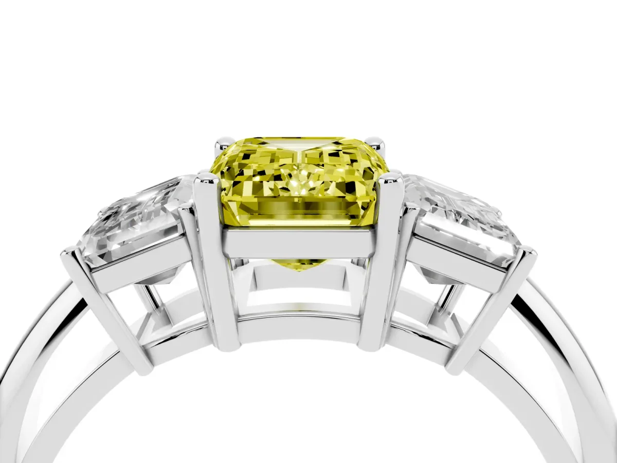 Fancy Yellow Three-Stone Emerald Cut Cut Diamond Engagement Ring with Prong Setting on a White Gold Band Platinum