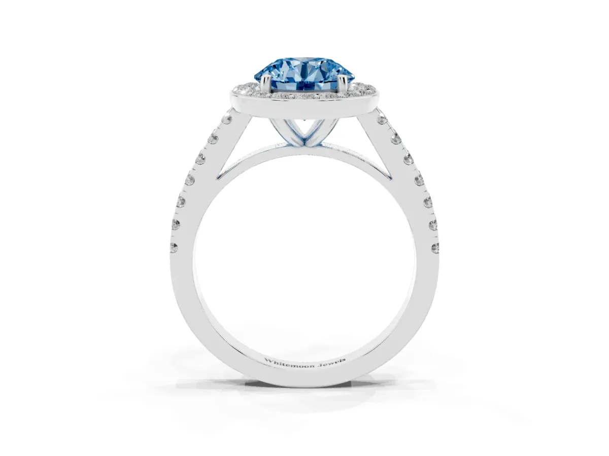 Fancy Blue Round Cut Diamond Halo Ring with Round Pavé Split Shank and Prong Setting Platinum