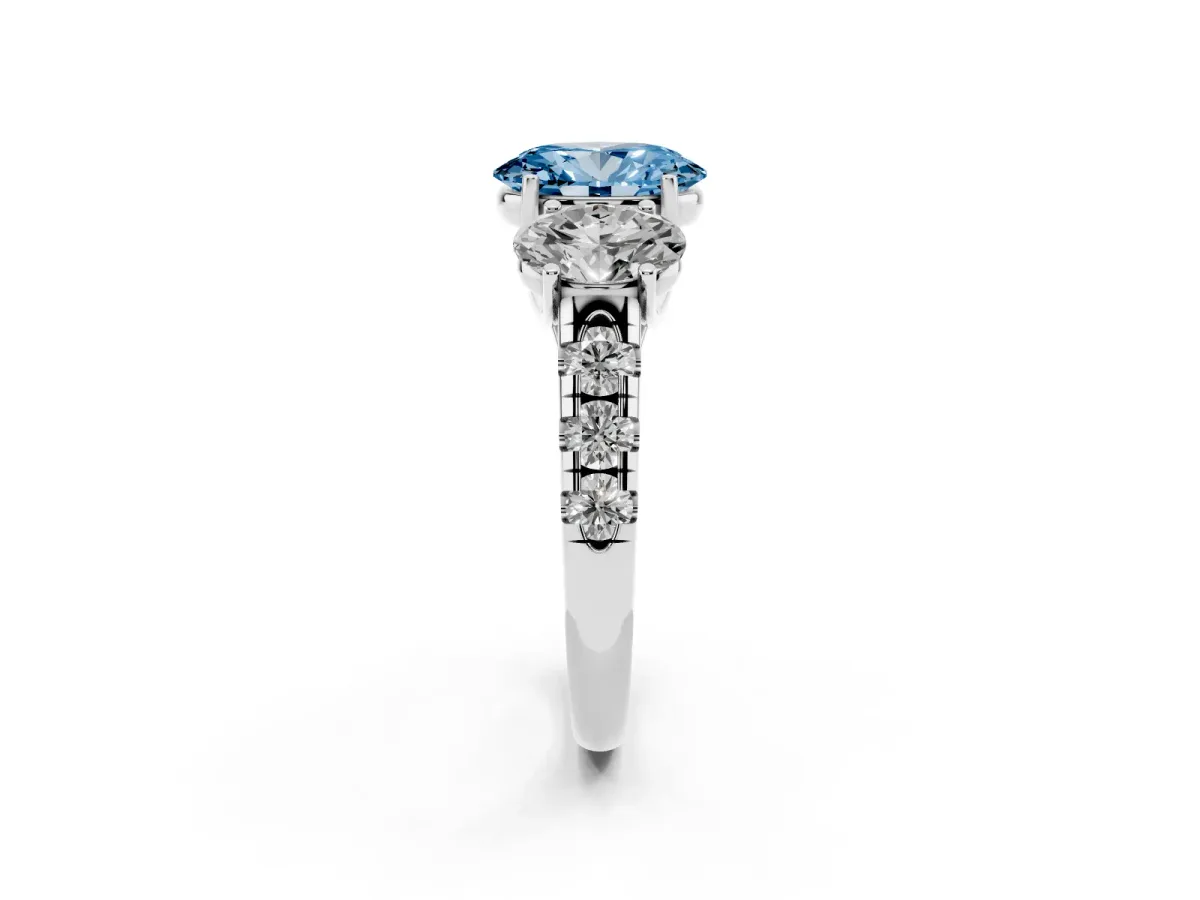 Fancy Blue Three-Stone Oval Cut Diamond Pavé Band with Prong Setting Platinum