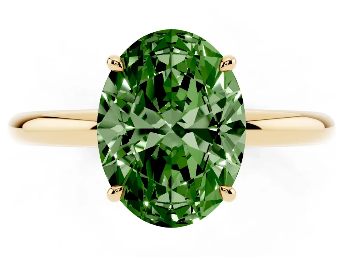 Fancy Green Oval Cut Diamond Solitaire Ring with Thin Band and Four-Prong Setting Yellow gold