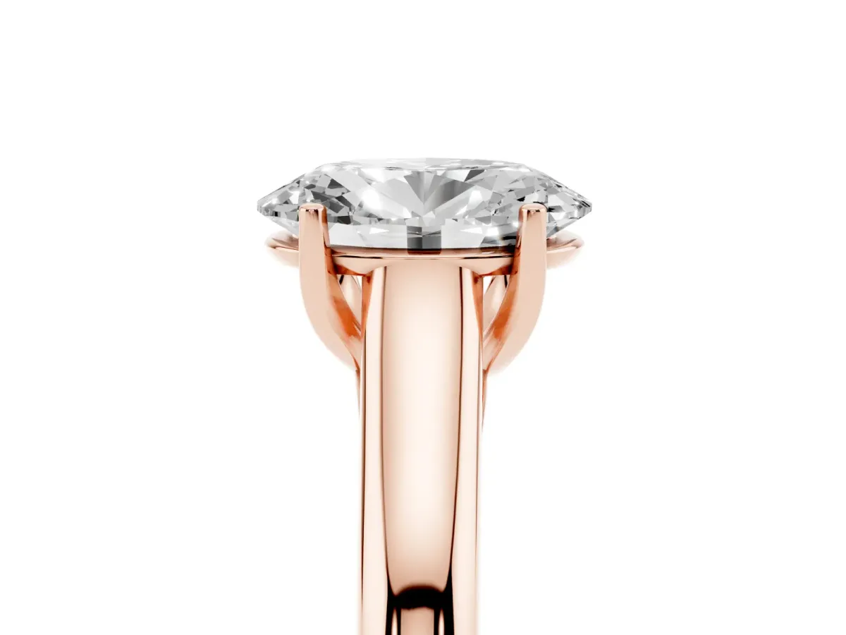 Oval Cut Solitaire Engagement Ring with Tapered Band and Four-Prong Setting Rose gold