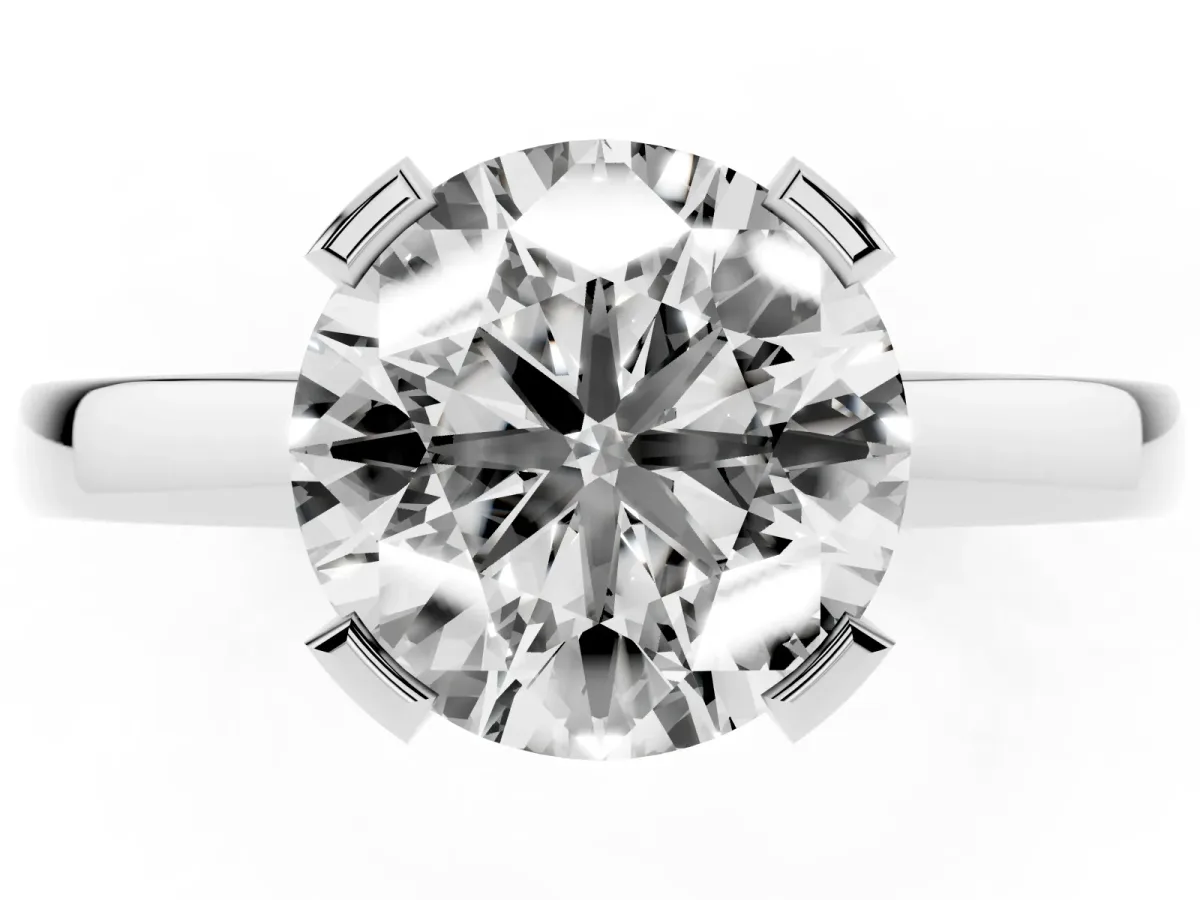 Round Cut Cut Solitaire Ring with Four-Prong Setting and Classic Band Silver