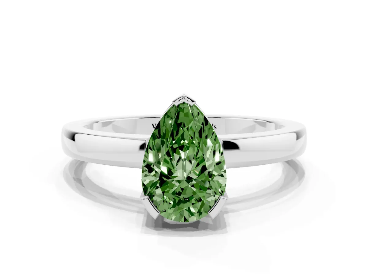 Fancy Green Pear Cut Cut Solitaire Ring with Four-Prong Setting and Classic Band Silver
