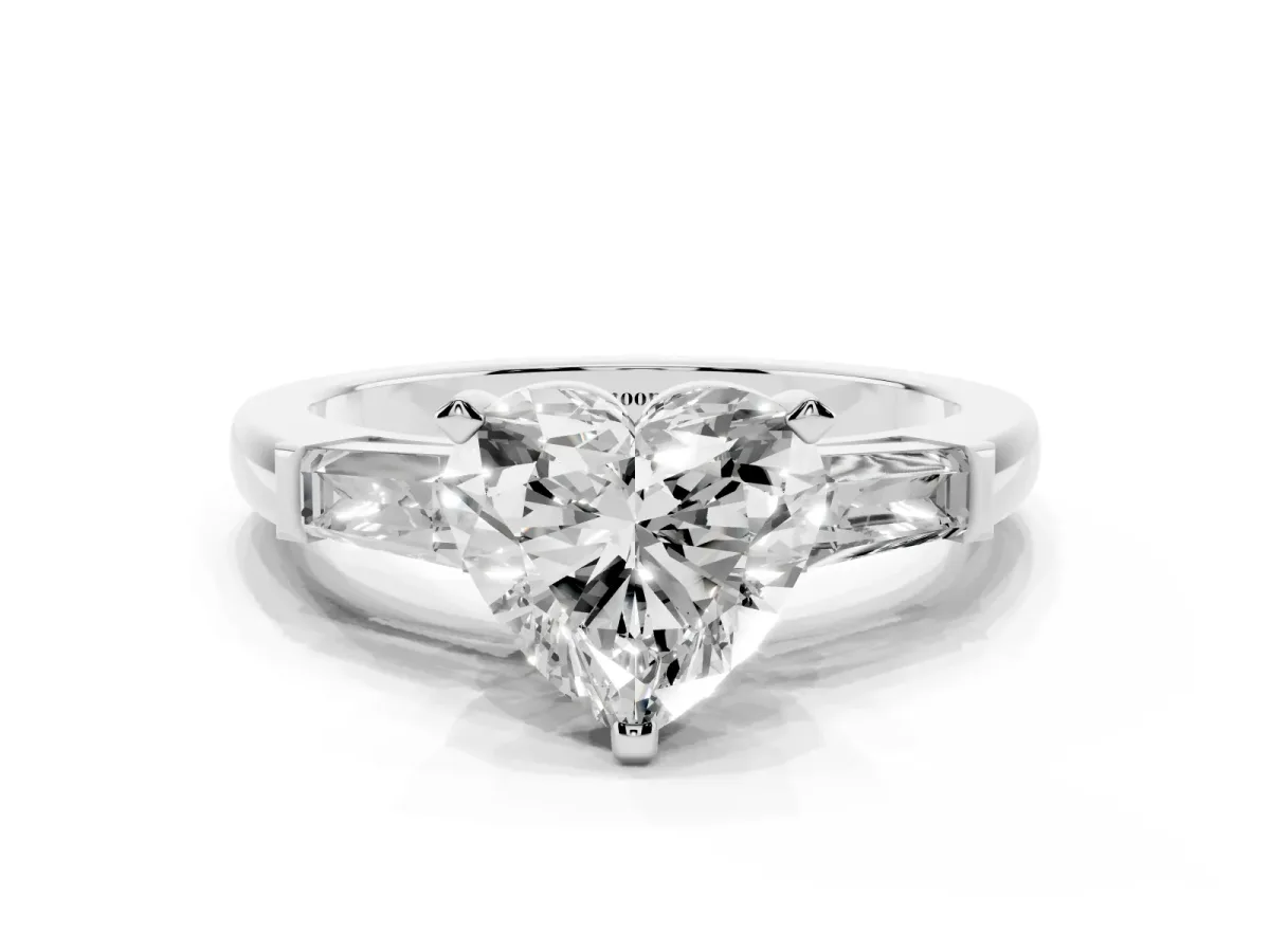 Heart Cut Solitaire with Tapered Baguette Side Stones on a Classic Band with Four-Prong Setting Silver