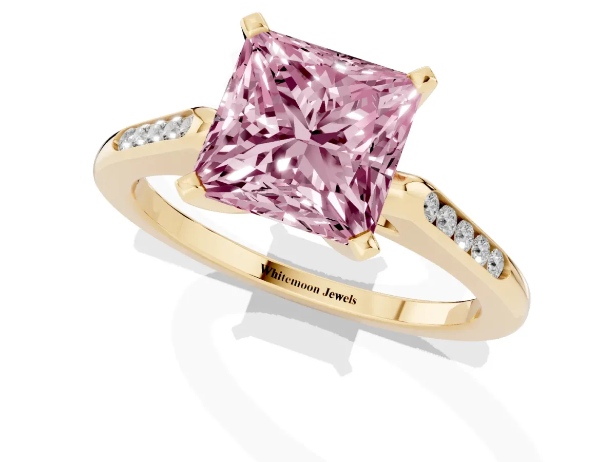 Fancy Pink Princess Cut Diamond Solitaire Ring with Channel Set Round Band and Prong Setting Yellow gold