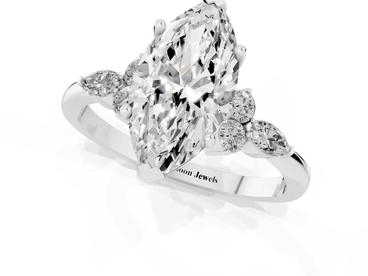 Marquise Cut Brilliant Diamond Solitaire Ring with Pear Side Stones and Four-Prong Setting Platinum