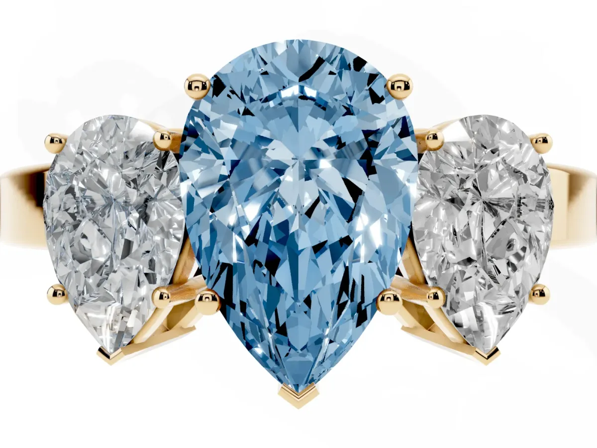 Fancy Blue Three-Stone Pear Cut Cut Diamond Engagement Ring with Flat Band and Four-Prong Setting Yellow gold