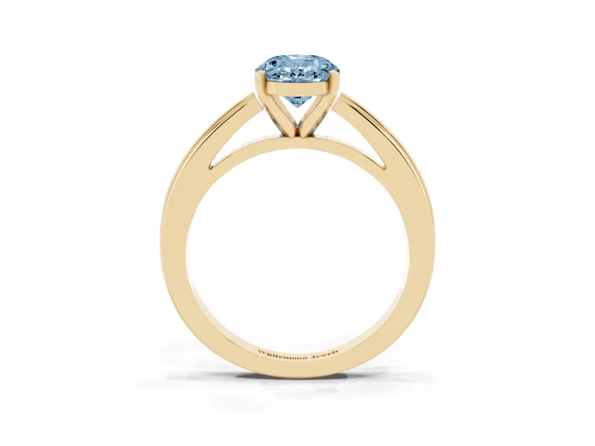 Fancy Blue Oval Cut Solitaire Diamond Ring with Four-Prong Setting and Classic Band Yellow gold