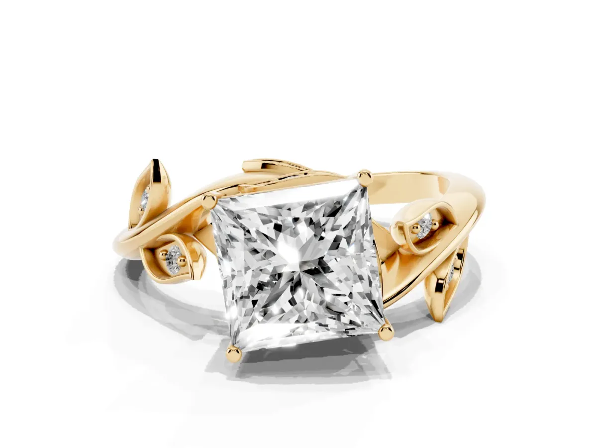 Princess Cut Solitaire Twist Engagement Ring with Leaf Accents and Prong Setting Yellow gold