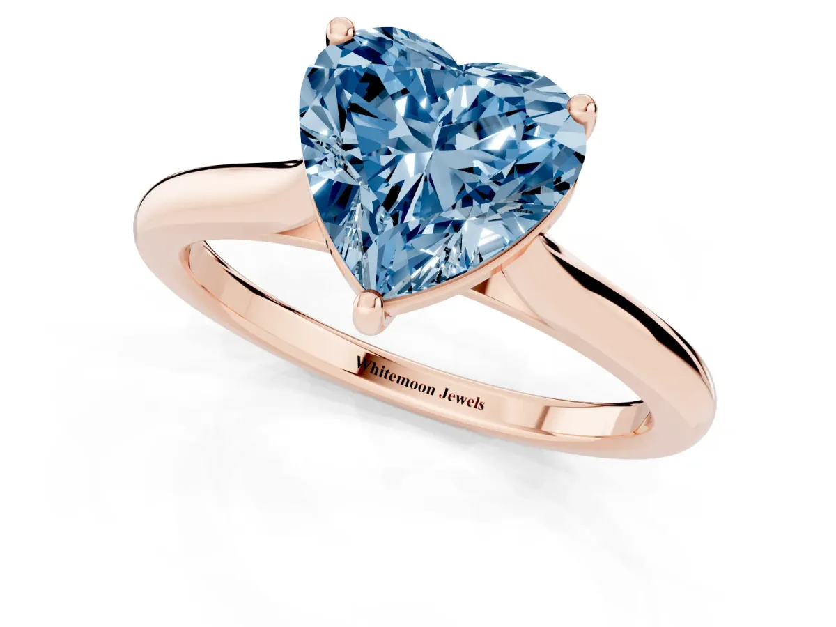 Fancy Blue Heart Cut Cut Solitaire Ring with Cathedral Band and Four-Prong Setting Rose gold