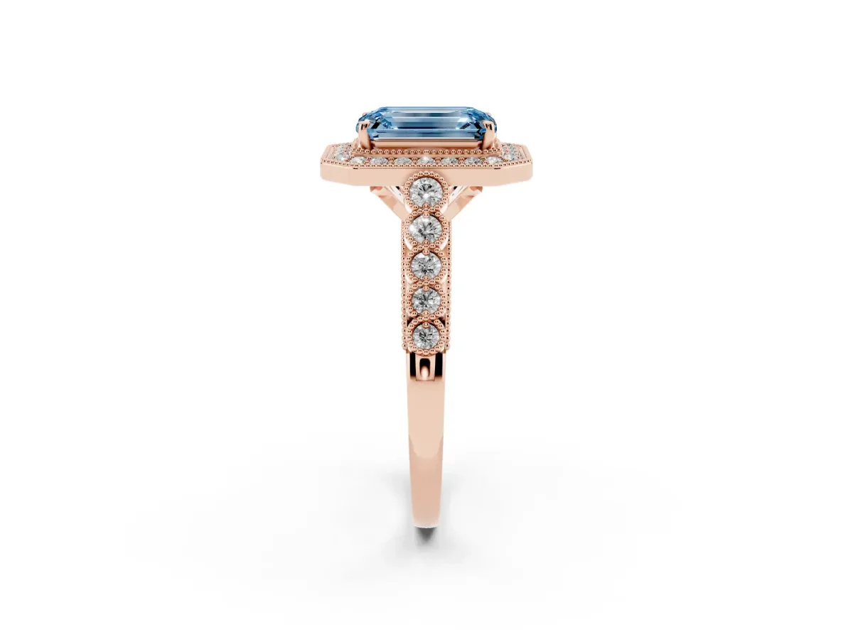 Fancy Blue Emerald Cut Halo Milgrain Solitaire with Bezel Set Side Stones and Pave Band Rose gold