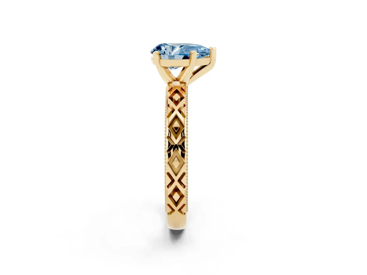 Fancy Blue Pear Cut Solitaire Diamond Ring with Milgrain and Black Enamel X Pattern Band Yellow gold