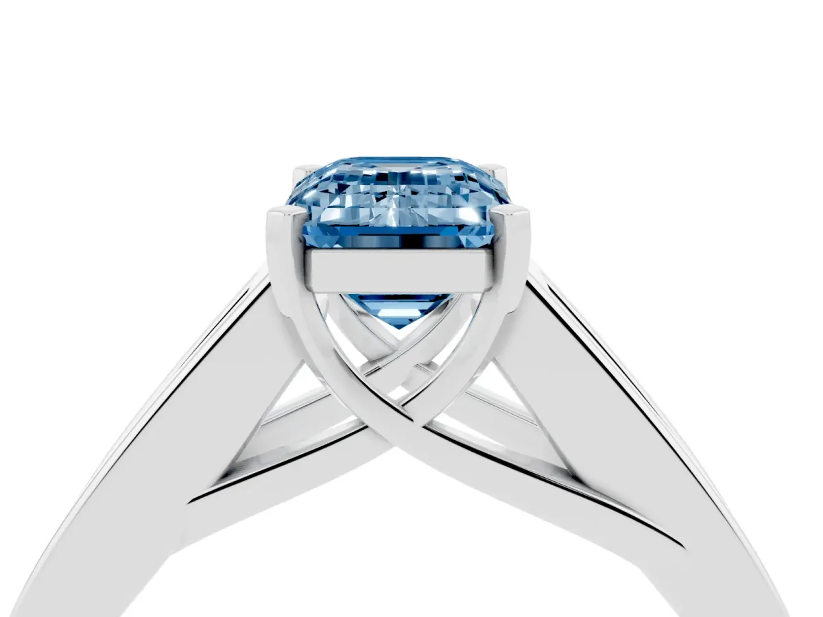 Fancy Blue Emerald Cut Cut Channel Set Solitaire Ring with Four-Prong Setting Platinum