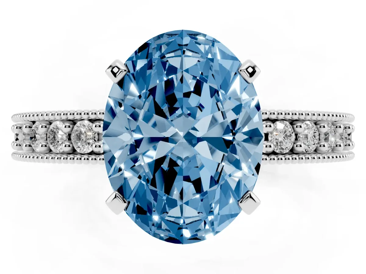 Fancy Blue Oval Cut Diamond Milgrain Pavé Engagement Ring with Four-Prong Setting Platinum