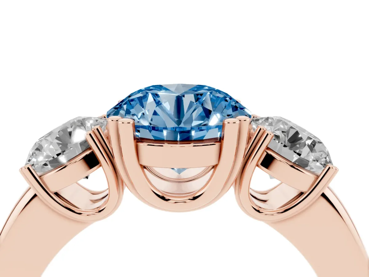 Fancy Blue Three-Stone Round Cut Cut Diamond Ring with Channel Set Band and Four-Prong Setting Rose gold
