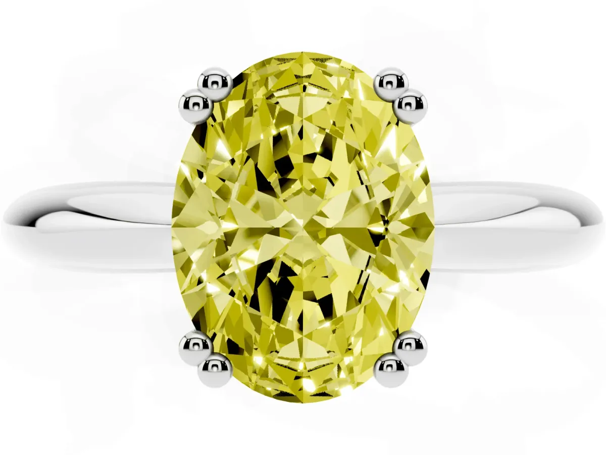 Fancy Yellow Oval Cut Cut Solitaire Engagement Ring with Tapered Band and Four-Prong Setting Silver