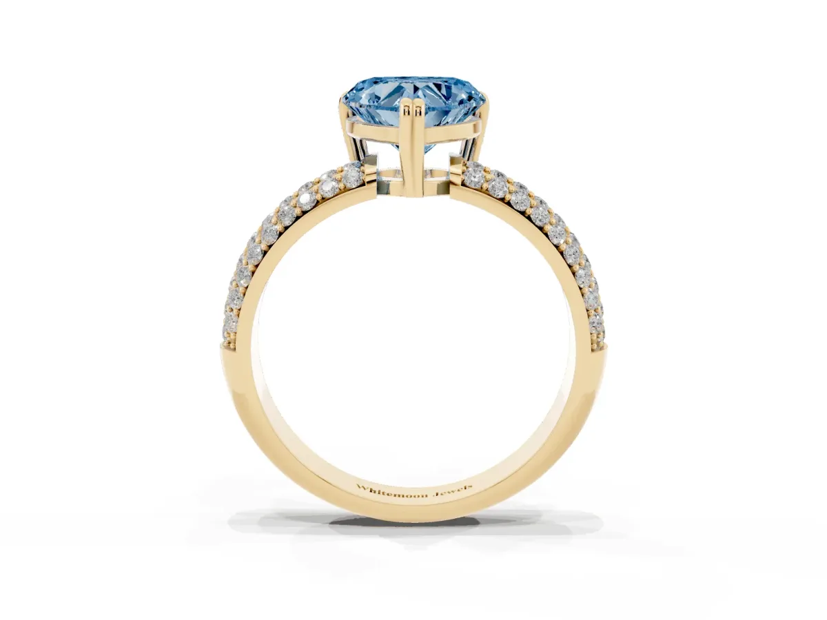 Fancy Blue Heart Cut Diamond Solitaire Ring with Multi-Row Round Pavé Band and Prong Setting Yellow gold