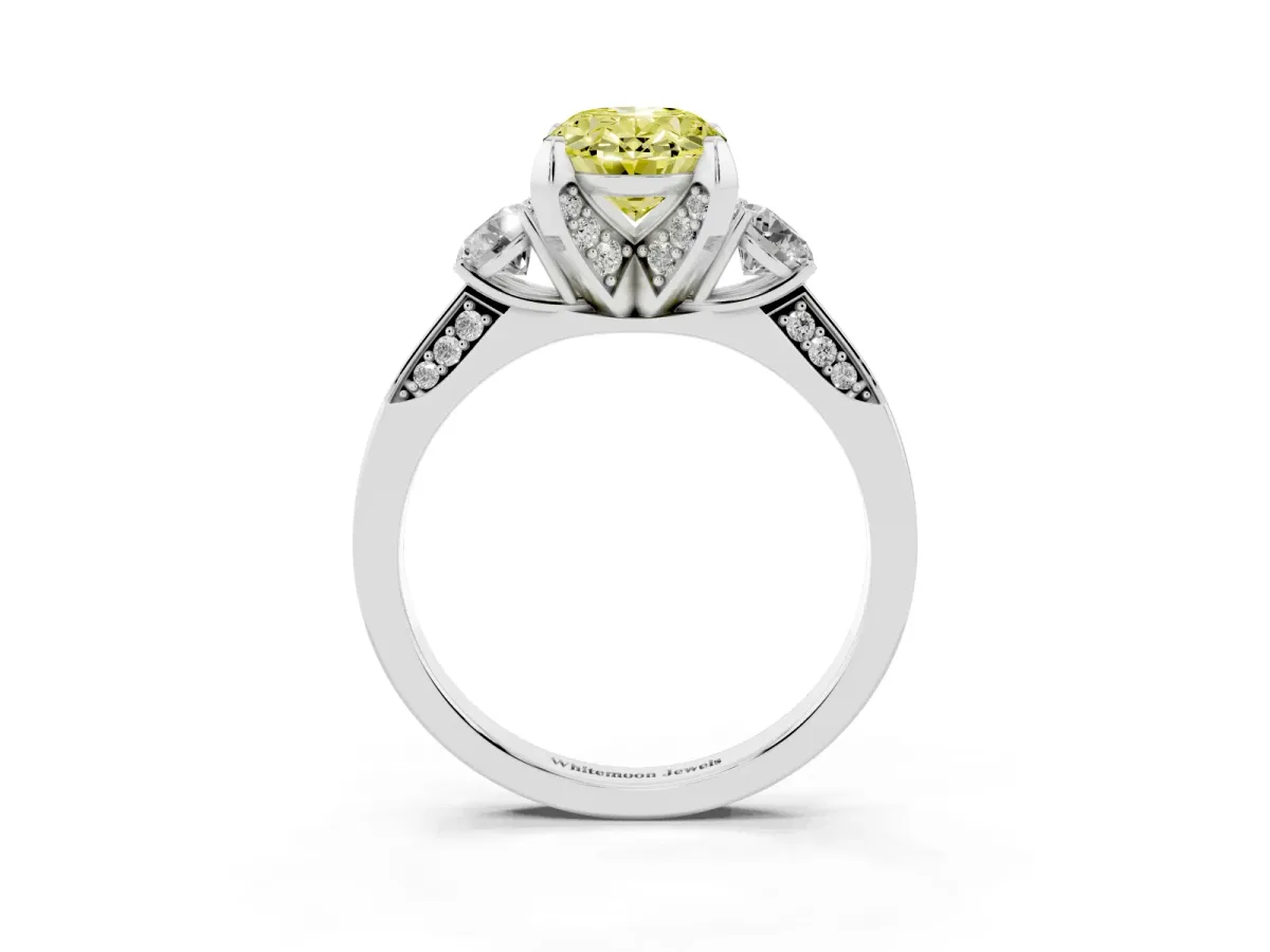 Fancy Yellow Oval Cut Brilliant Three-Stone Diamond Ring with Pavé Band and Four-Prong Setting Silver