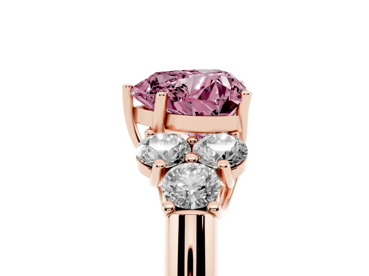 Fancy Pink Heart Cut Cut Diamond Cluster Ring with Round Accent Stones and Prong Setting on a Classic Band Rose gold