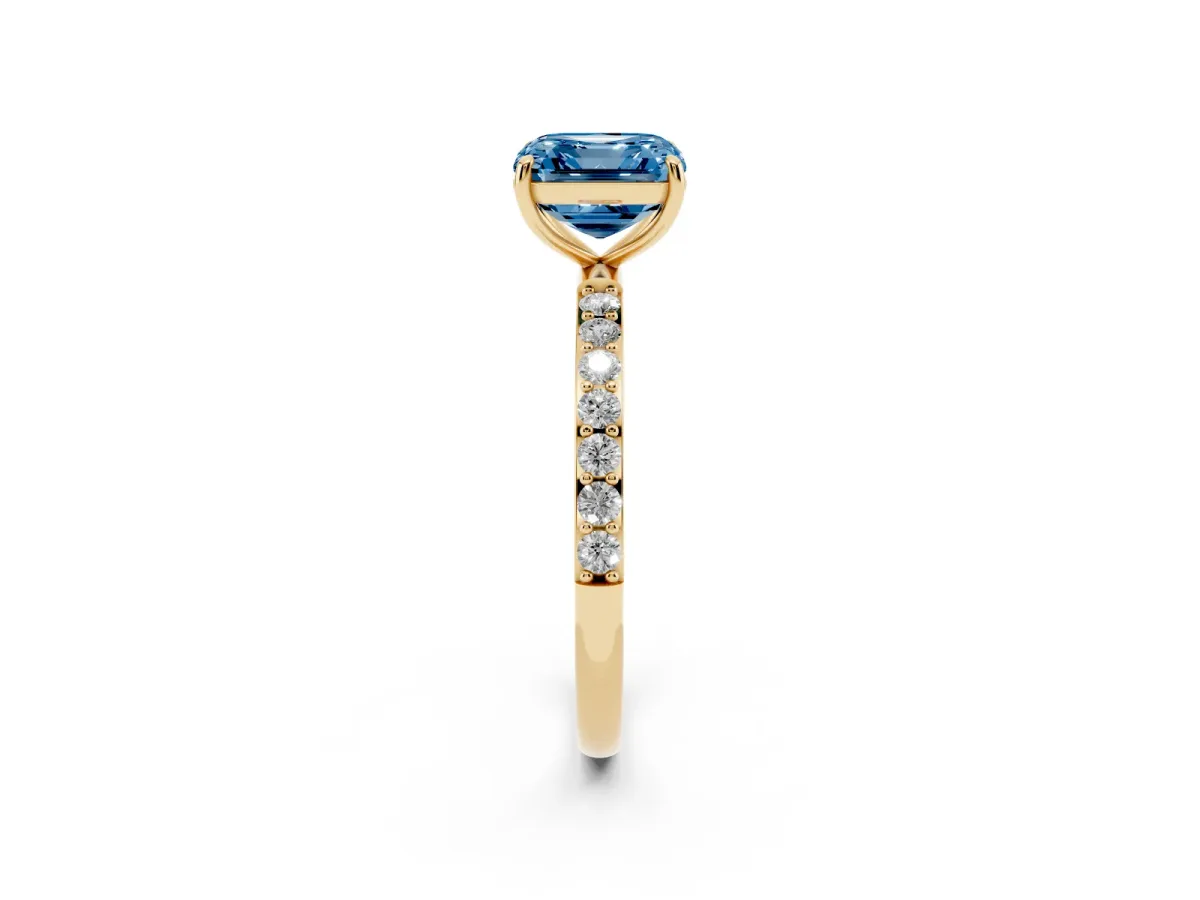 Fancy Blue Asscher Cut Diamond Solitaire Ring with Round Pavé Shoulders and Prong Setting Yellow gold