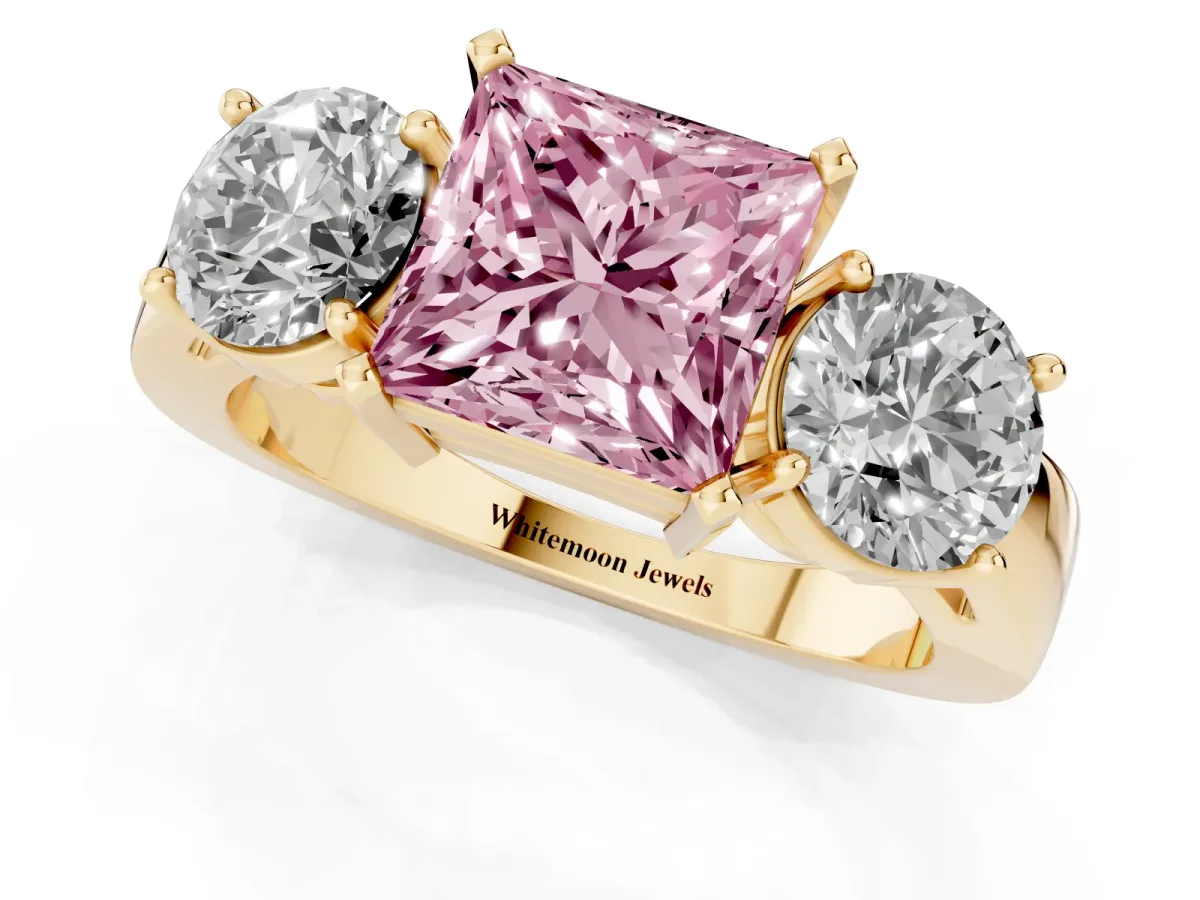 Fancy Pink Three-Stone Princess Cut Diamond Ring with Round Side Stones, Classic Band, and Four-Prong Setting Yellow gold