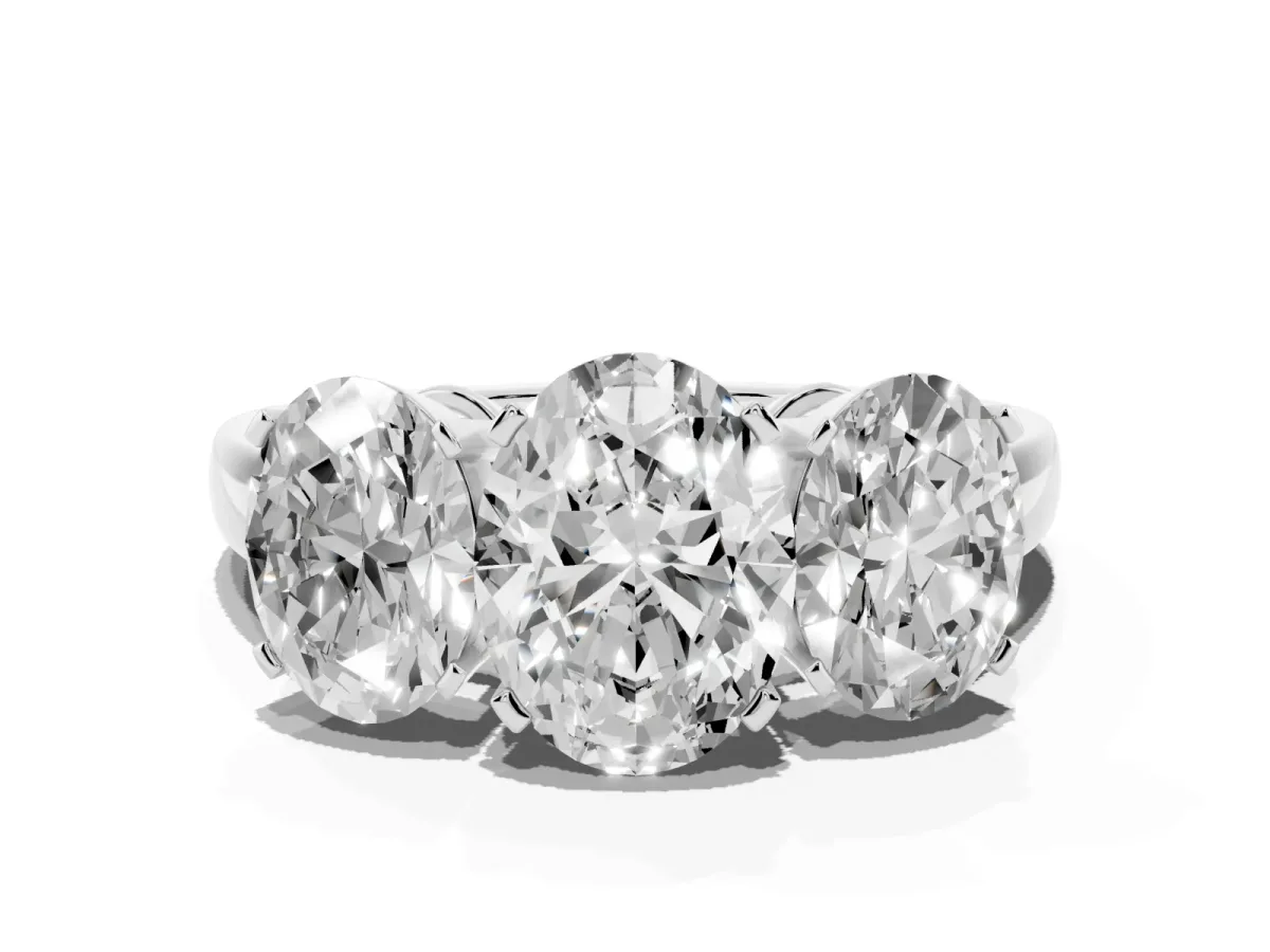 Three-Stone Oval Cut Cut Diamond Ring with Channel Set Band and Four-Prong Setting Silver