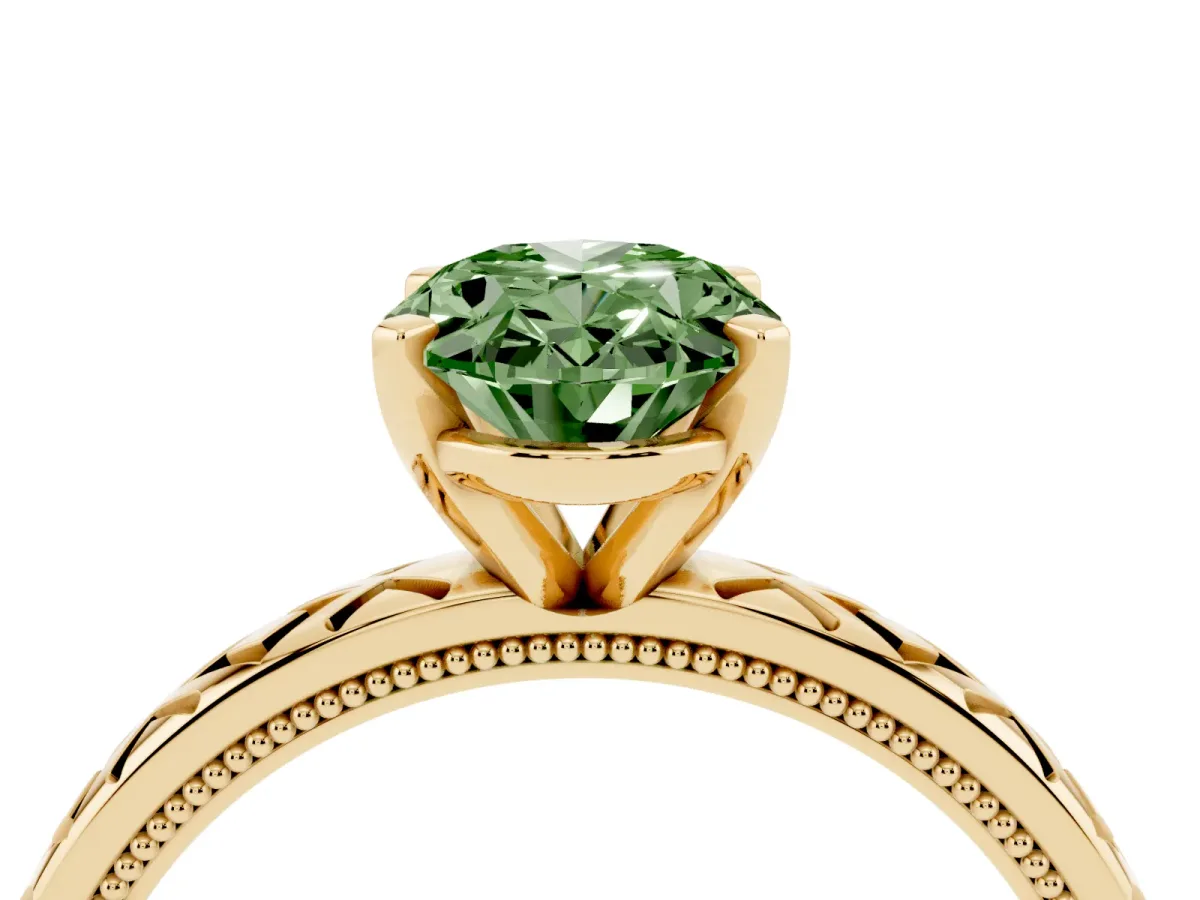Fancy Green Oval Cut Solitaire Diamond Ring with Milgrain and Black Enamel X Pattern Band Yellow gold