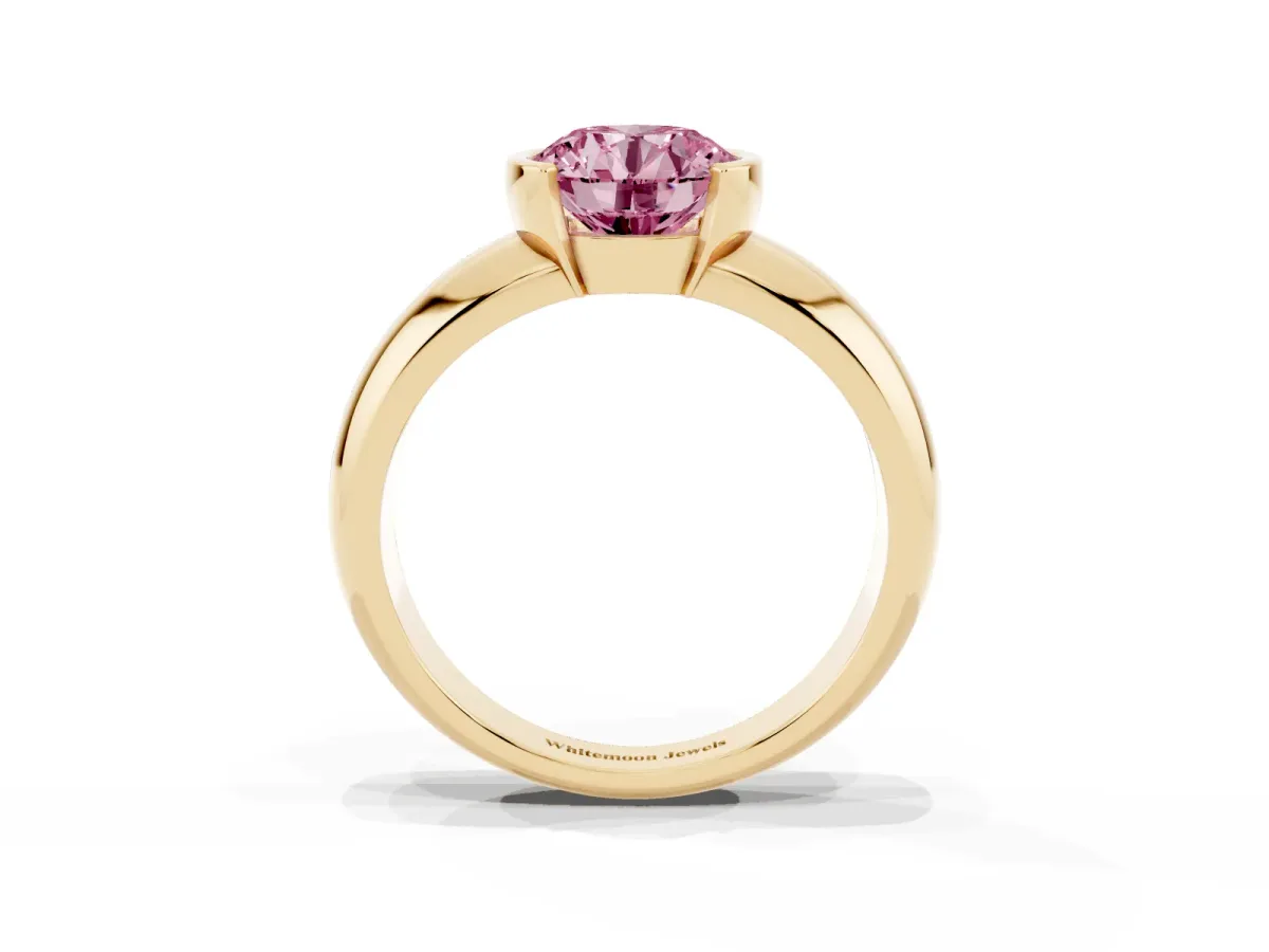 Fancy Pink Round Cut Solitaire Tension Set Diamond Ring with Wide Band Yellow gold