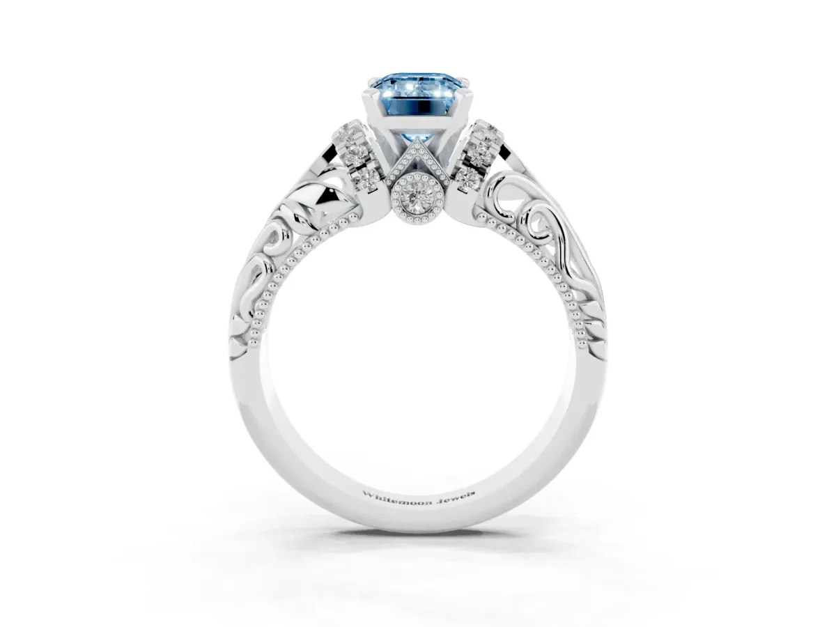 Fancy Blue Emerald Cut Solitaire Filigree Engagement Ring with Halo and Prong Setting White gold