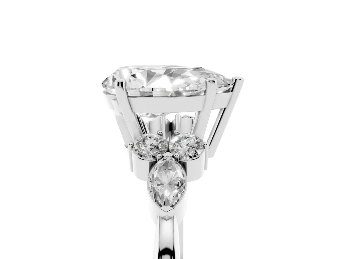 Pear Cut Brilliant Diamond Solitaire Ring with Pear Side Stones and Four-Prong Setting Silver