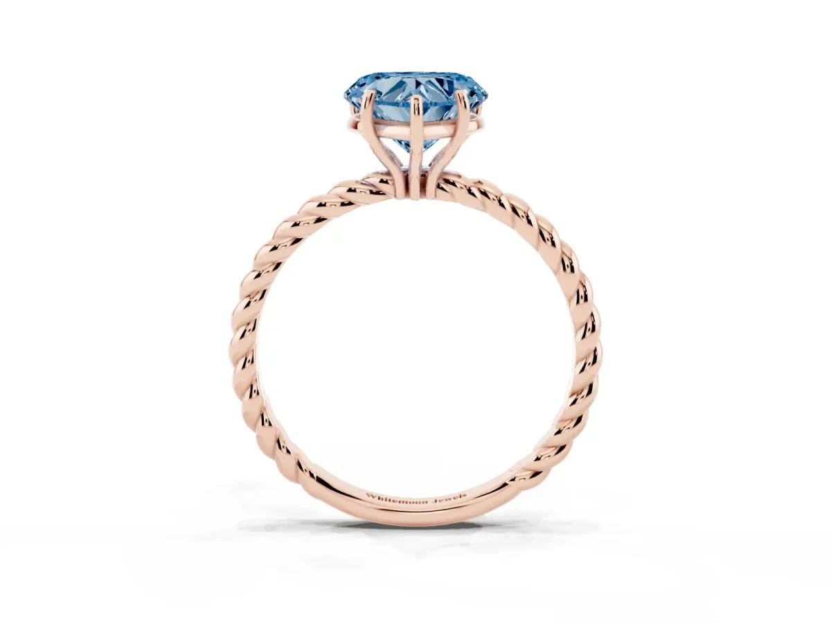 Fancy Blue Heart Cut Solitaire Twist Band Ring with Four-Prong Setting Rose gold