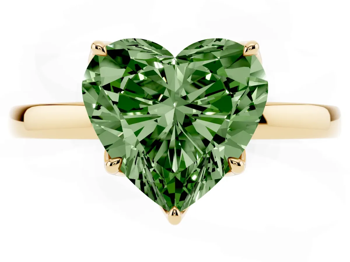Fancy Green Heart Cut Diamond Solitaire Ring with Thin Band and Prong Setting Yellow gold