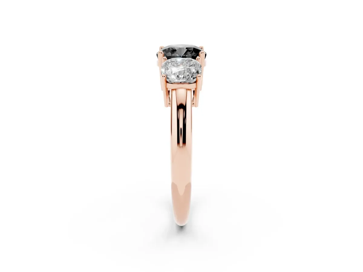 Fancy Black Three-Stone Cushion Cut Cut Diamond Engagement Ring with Prong Setting on a White Gold Band Rose gold