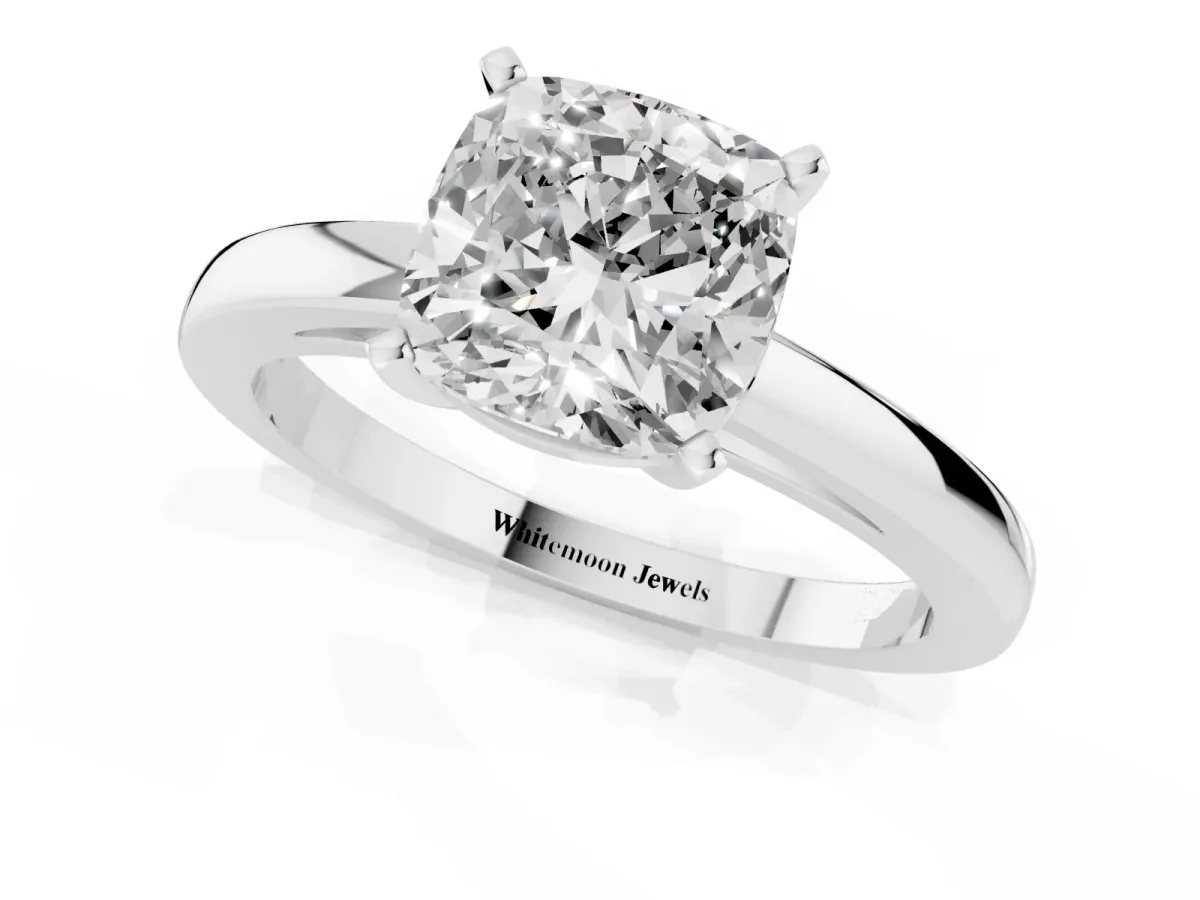 Cushion Cut Solitaire Diamond Engagement Ring with Four-Prong Setting on a Classic Band Silver