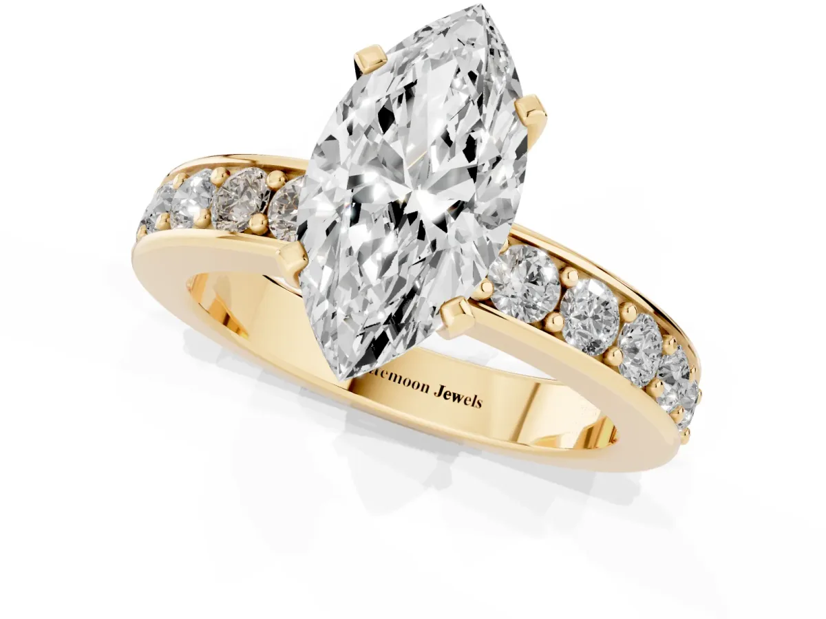 Marquise Cut Diamond Engagement Ring with Channel Set Round Band and Prong Setting Yellow gold