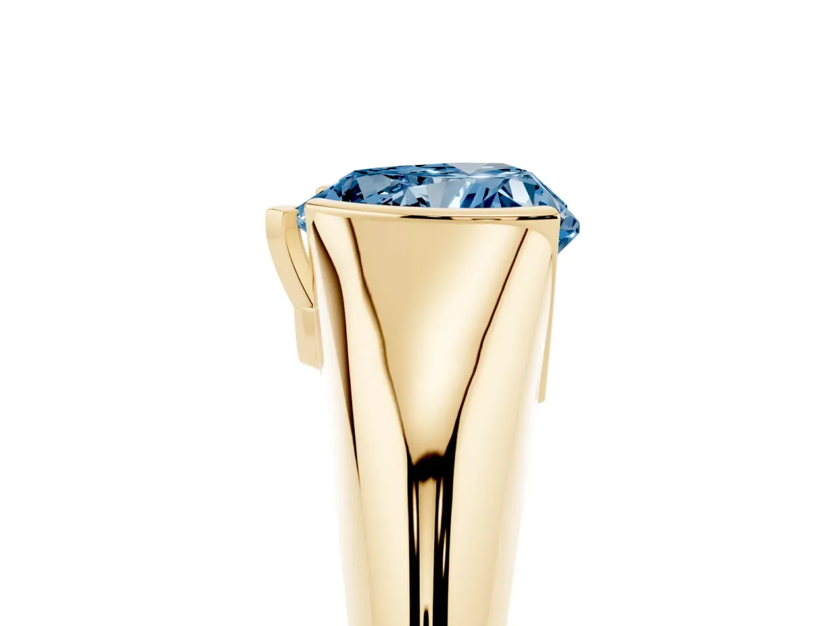 Fancy Blue Heart Cut Solitaire Tension Set Diamond Ring Yellow gold