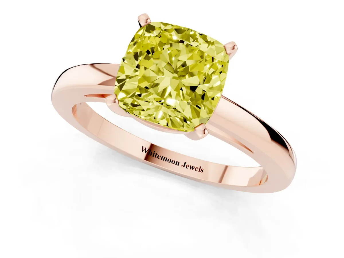 Fancy Yellow Cushion Cut Solitaire Diamond Engagement Ring with Four-Prong Setting on a Classic Band Rose gold