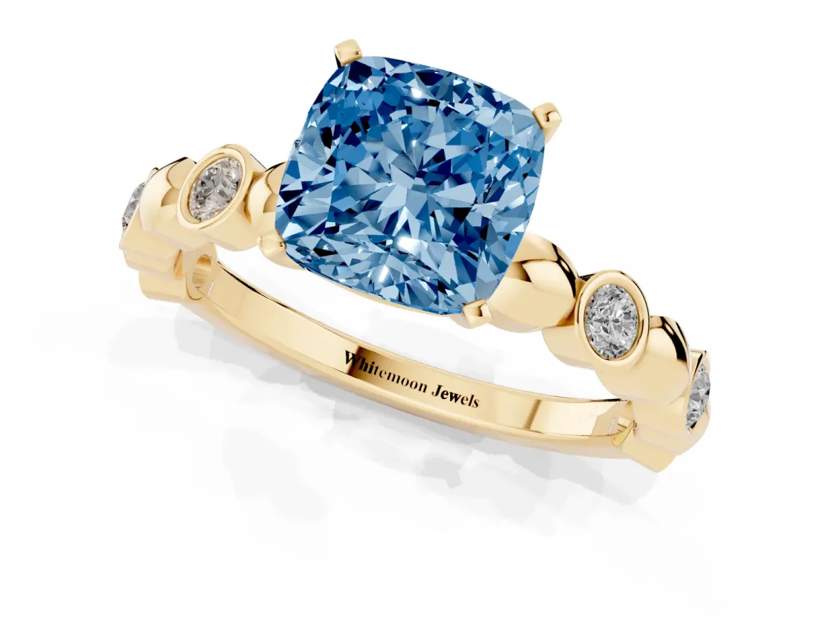 Fancy Blue Cushion Cut Solitaire Bezel-Set Diamond Ring with Beaded Band and Four-Prong Setting Yellow gold
