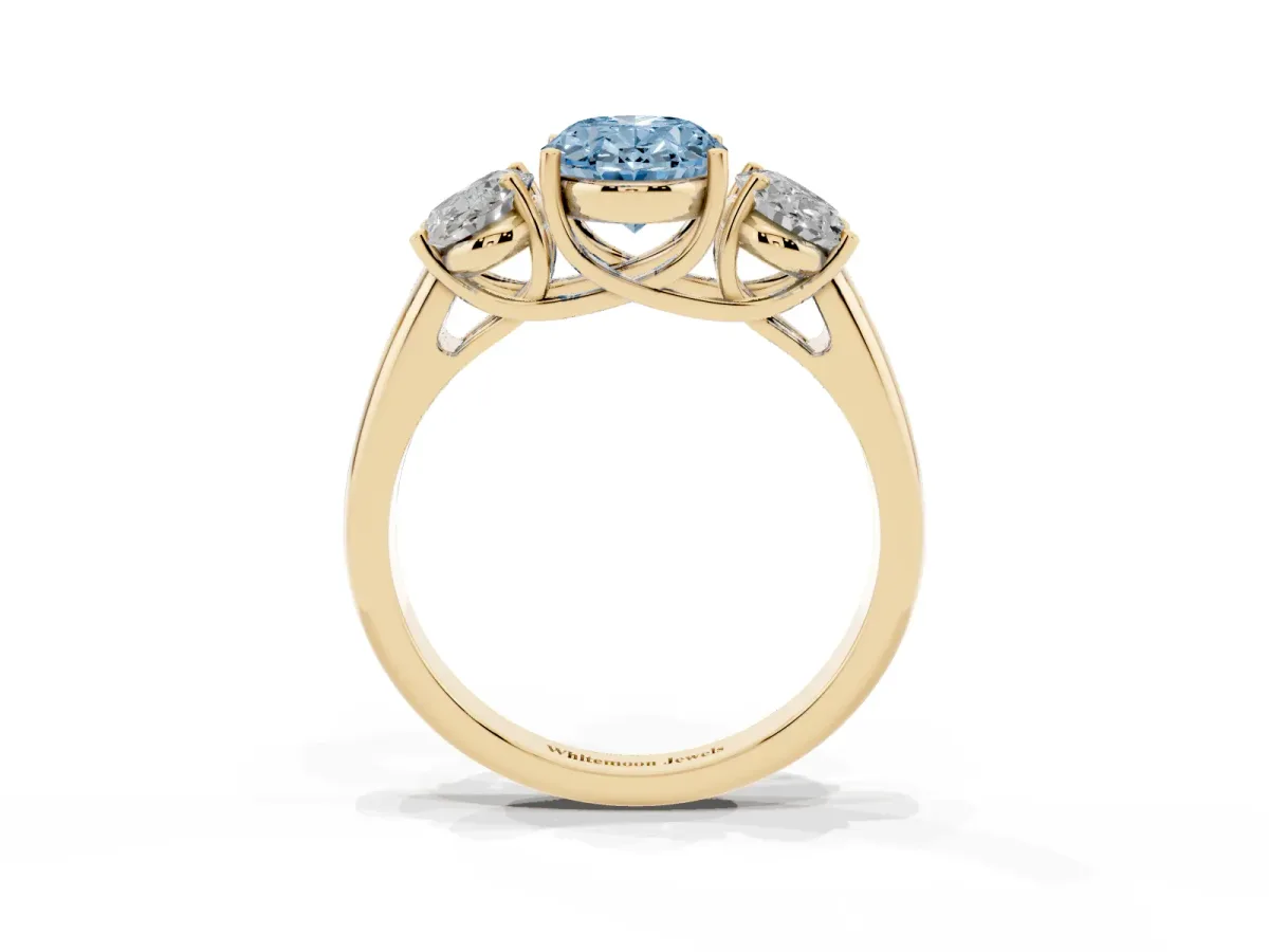 Fancy Blue Three-Stone Oval Cut Diamond Engagement Ring with Prong Setting Yellow gold