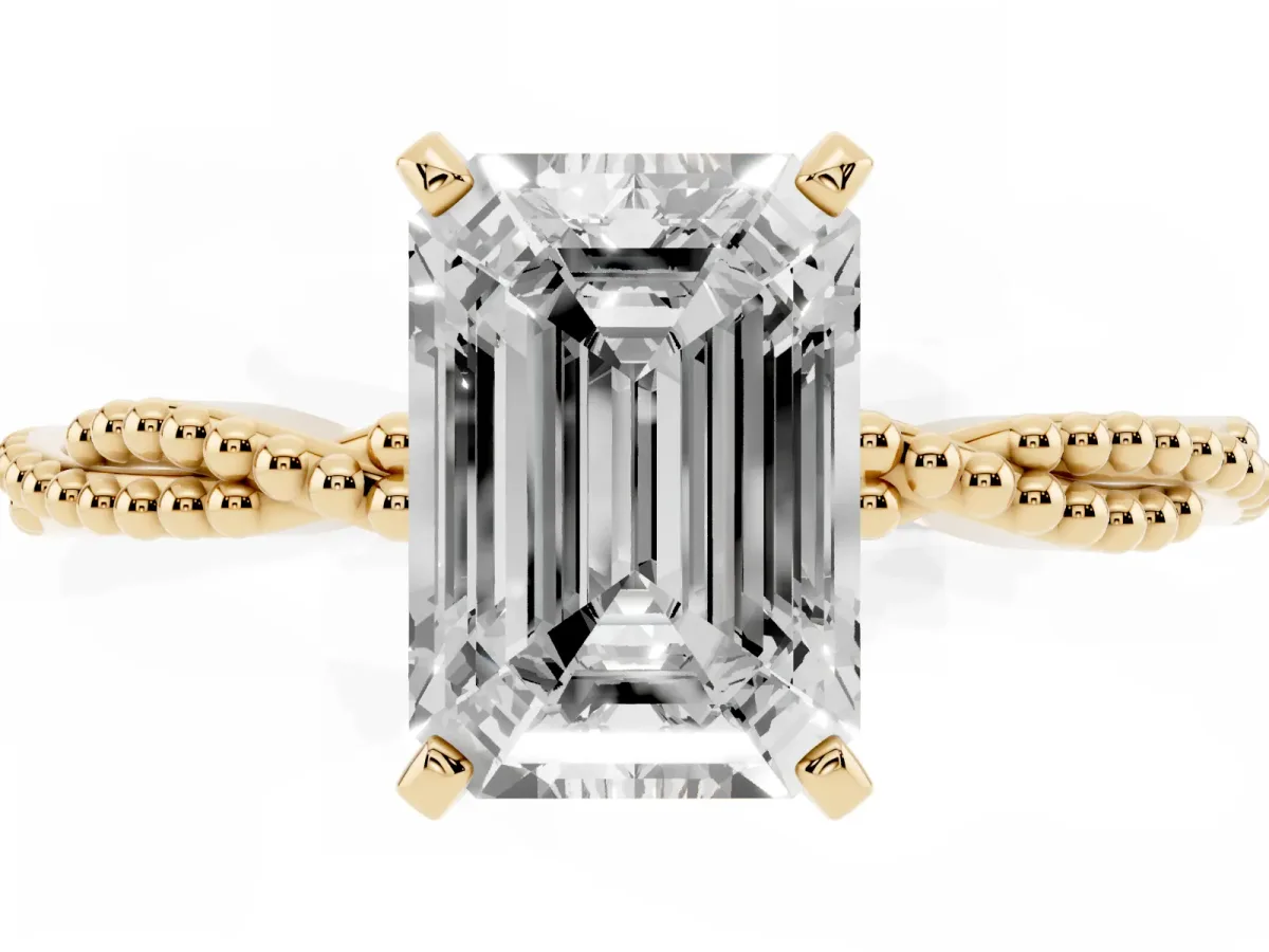 Emerald Cut Solitaire Twisted Band with Bead Prong Setting Yellow gold