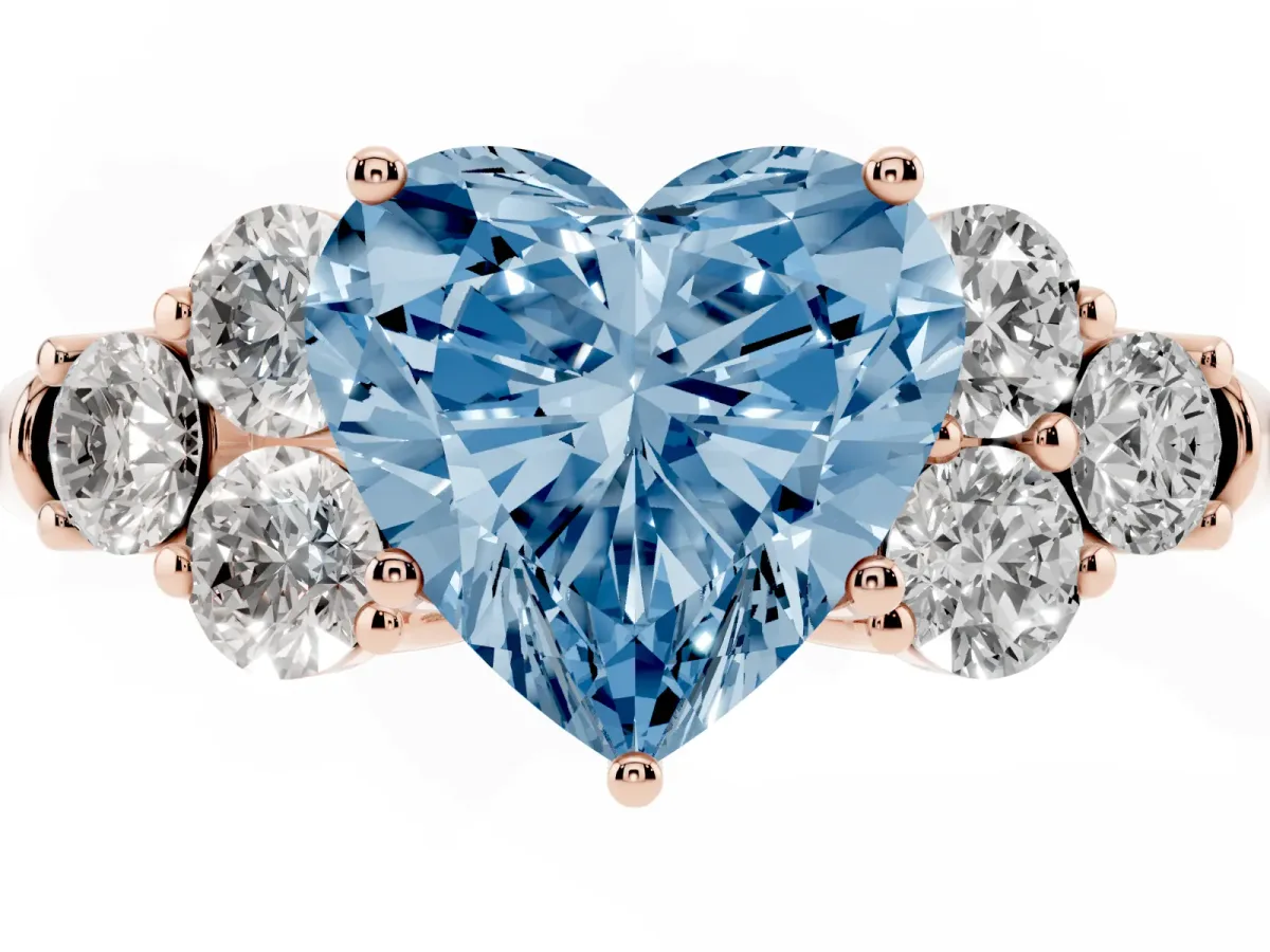 Fancy Blue Heart Cut Cut Diamond Cluster Ring with Round Accent Stones and Prong Setting on a Classic Band Rose gold